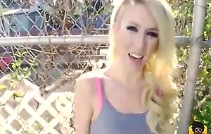 Blonde punk slut flashing her titties on the farm