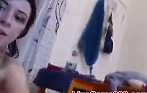 Adorable young teen plays with vibrator in the bath