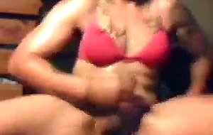 Oiled crossdresser jerks off