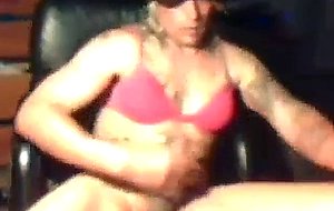 Oiled crossdresser jerks off