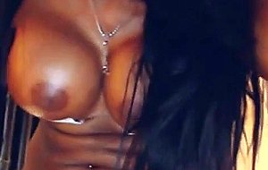 Busty black babe masturbates on webcam