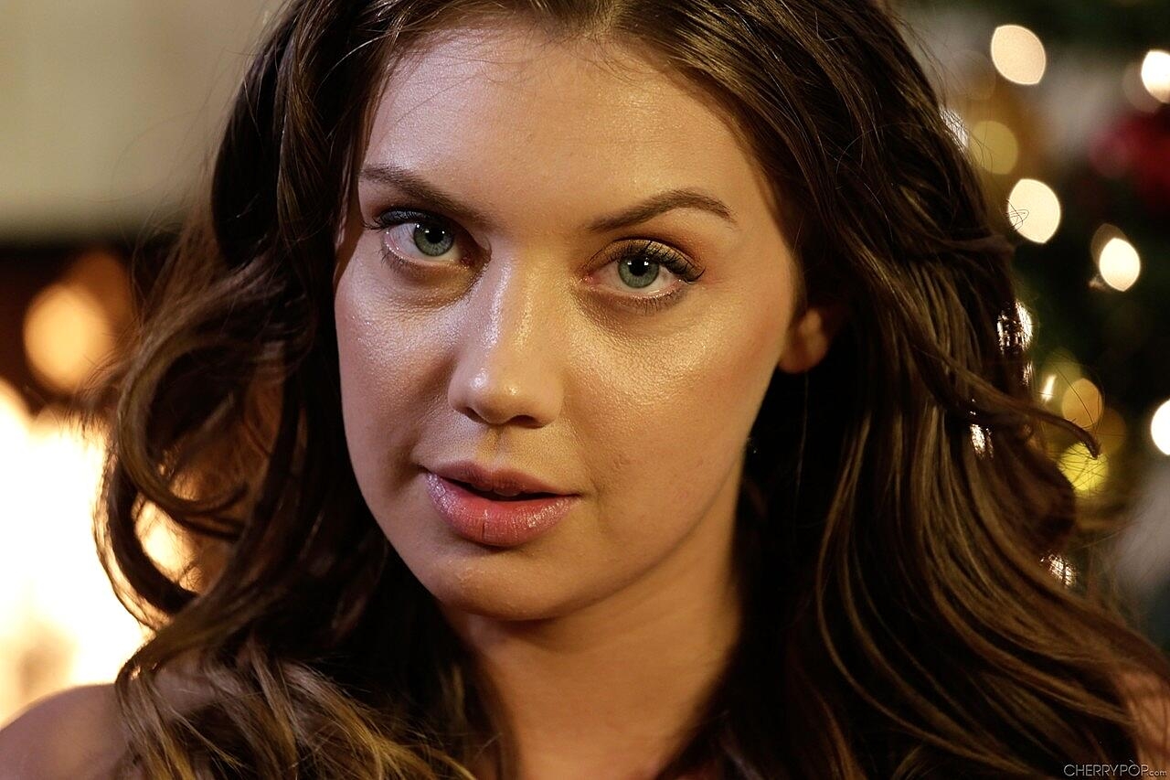 Pretty Russian brunette Elena Koshka gets down and dirty on a Xmas eve