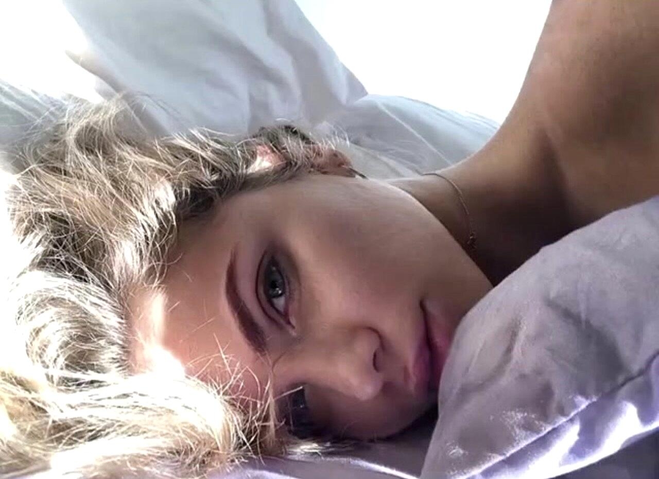 Sexy cam model shows off her beautiful petite body in bikinis