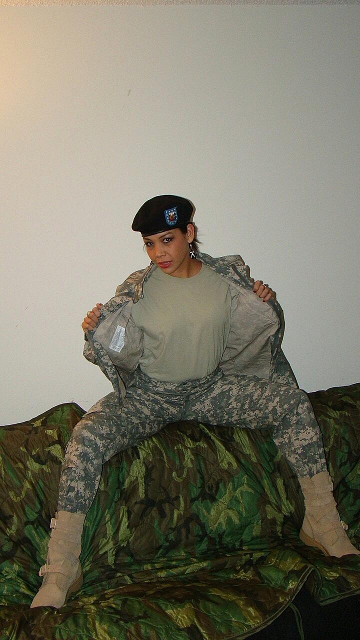Hot military girl peels off her combat uniform to tease nude in her panties
