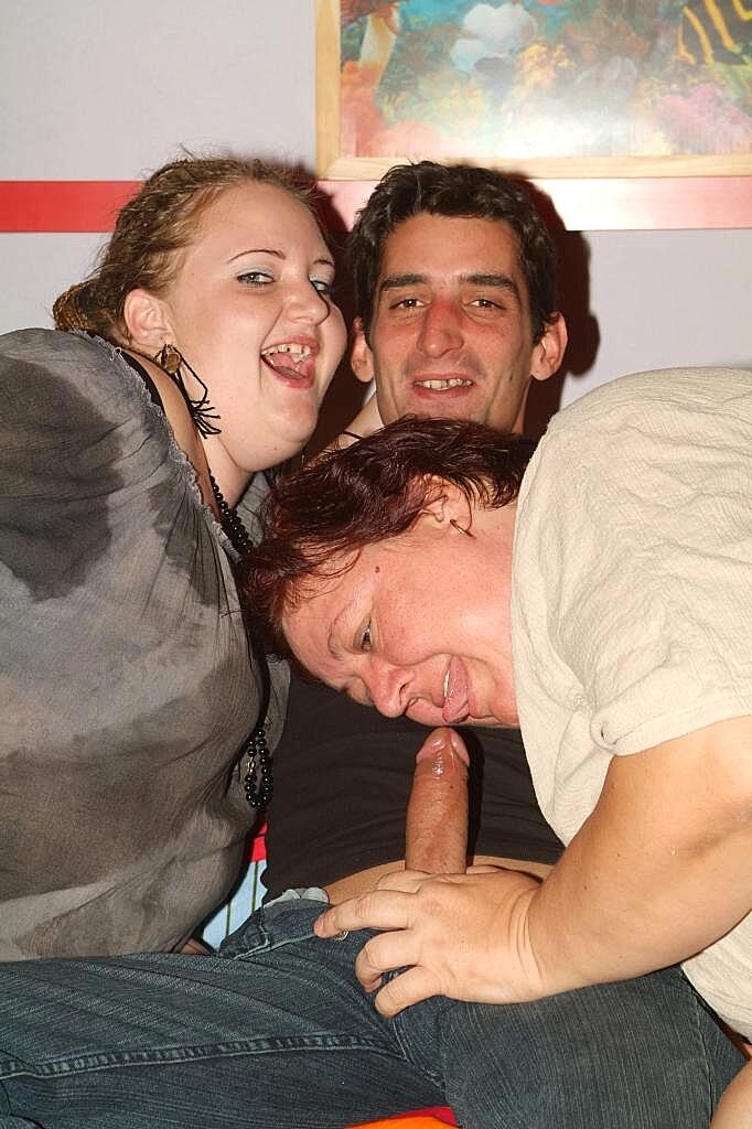 Obese women have a threesome with a willing young man on a sofa