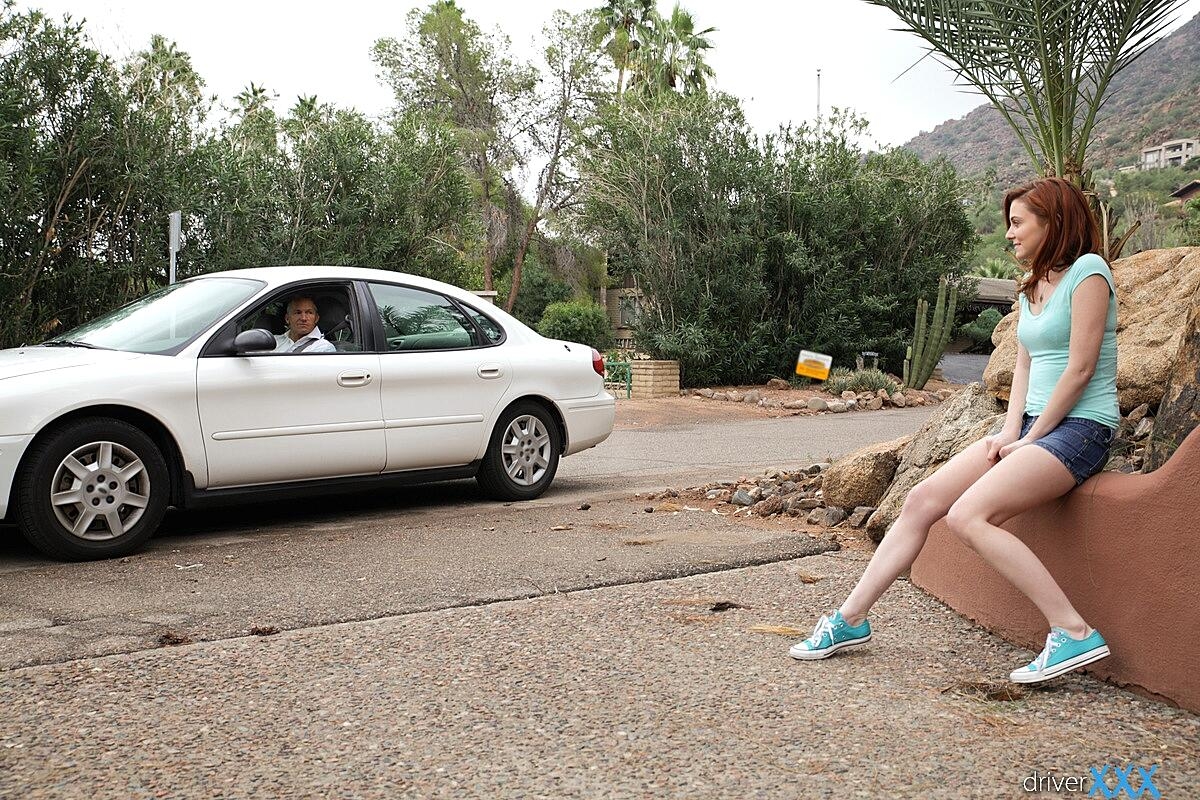 Young redhead Emma Evins wears jizz on her face after fucking inside an auto